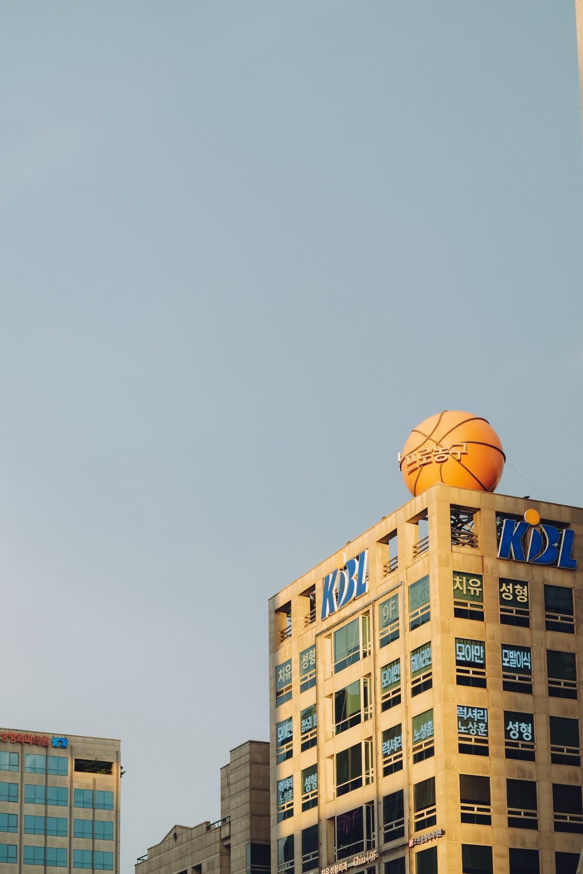 Seoul. A basketball the size of a room, on a roof.